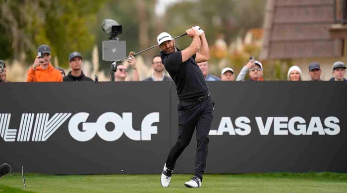 Dustin Johnson plays his shot from the 14th tee during the second round of the 2024 LIV Golf Las Vegas tournament at Las Vegas Country Club.